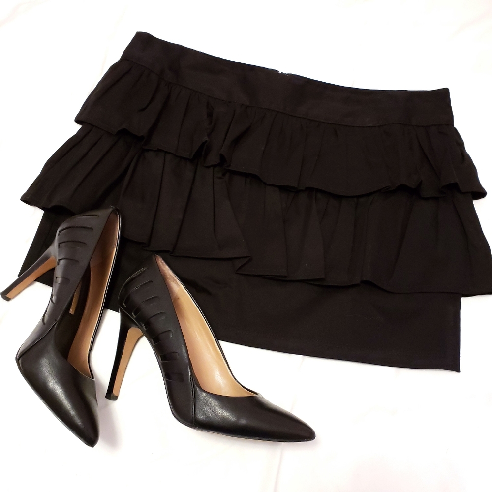 Black ruffle mini skirt
